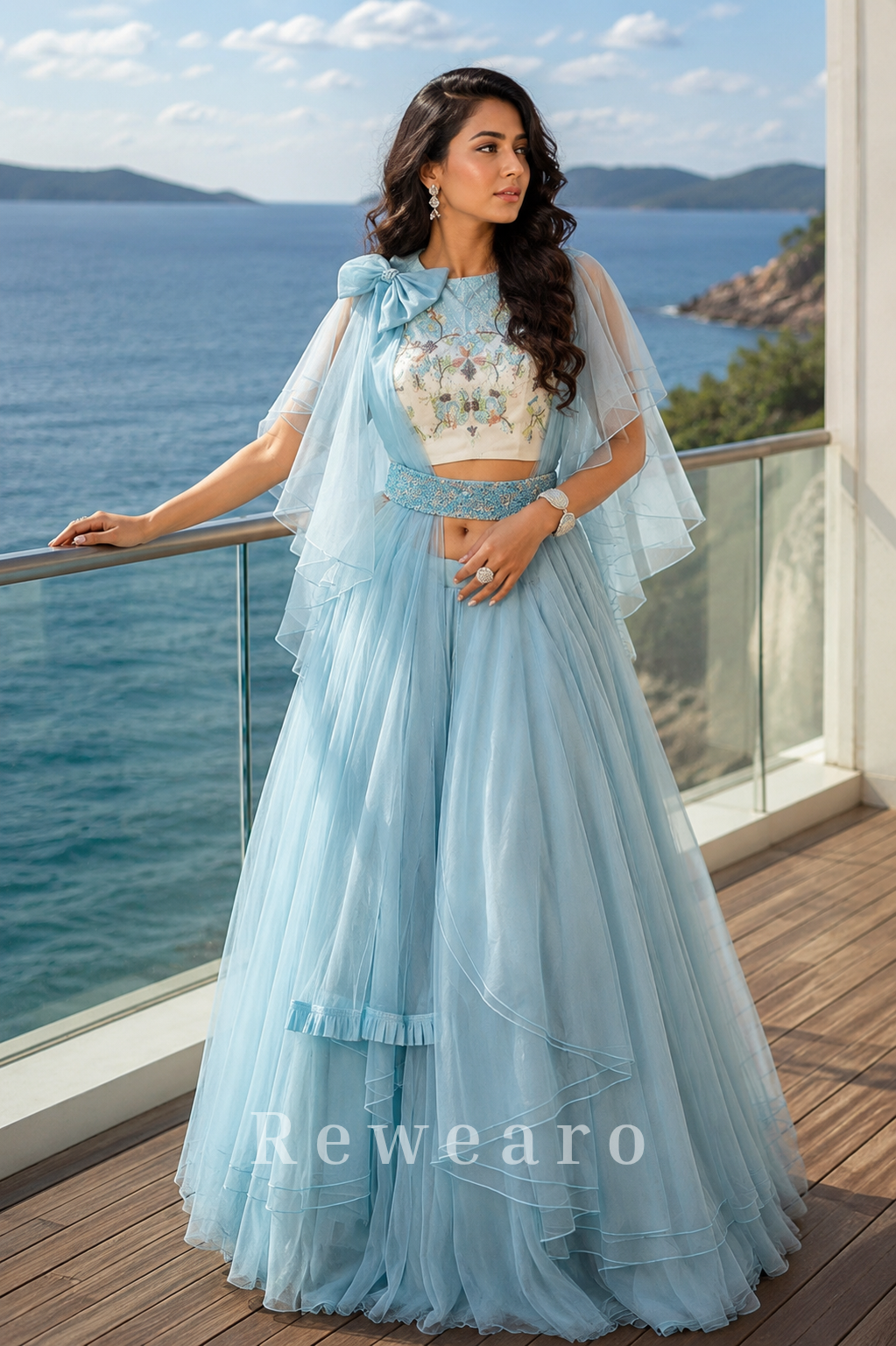 Powder Blue Layered Ruffle Lehenga Set with Printed Blouse and Dramatic Cape Sleeves