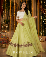 Pistachio Green Lehenga with Ivory Embroidered Choli & Sheer Dupatta