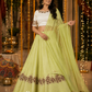 Pistachio Green Lehenga with Ivory Embroidered Choli & Sheer Dupatta