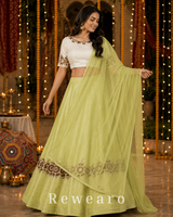 Pistachio Green Lehenga with Ivory Embroidered Choli & Sheer Dupatta