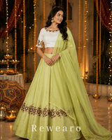 Pistachio Green Lehenga with Ivory Embroidered Choli & Sheer Dupatta