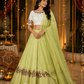 Pistachio Green Lehenga with Ivory Embroidered Choli & Sheer Dupatta