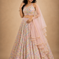 Pastel Mosaic Printed Lehenga Set with Layered Ruffle Dupatta and Contemporary Embroidered Blouse