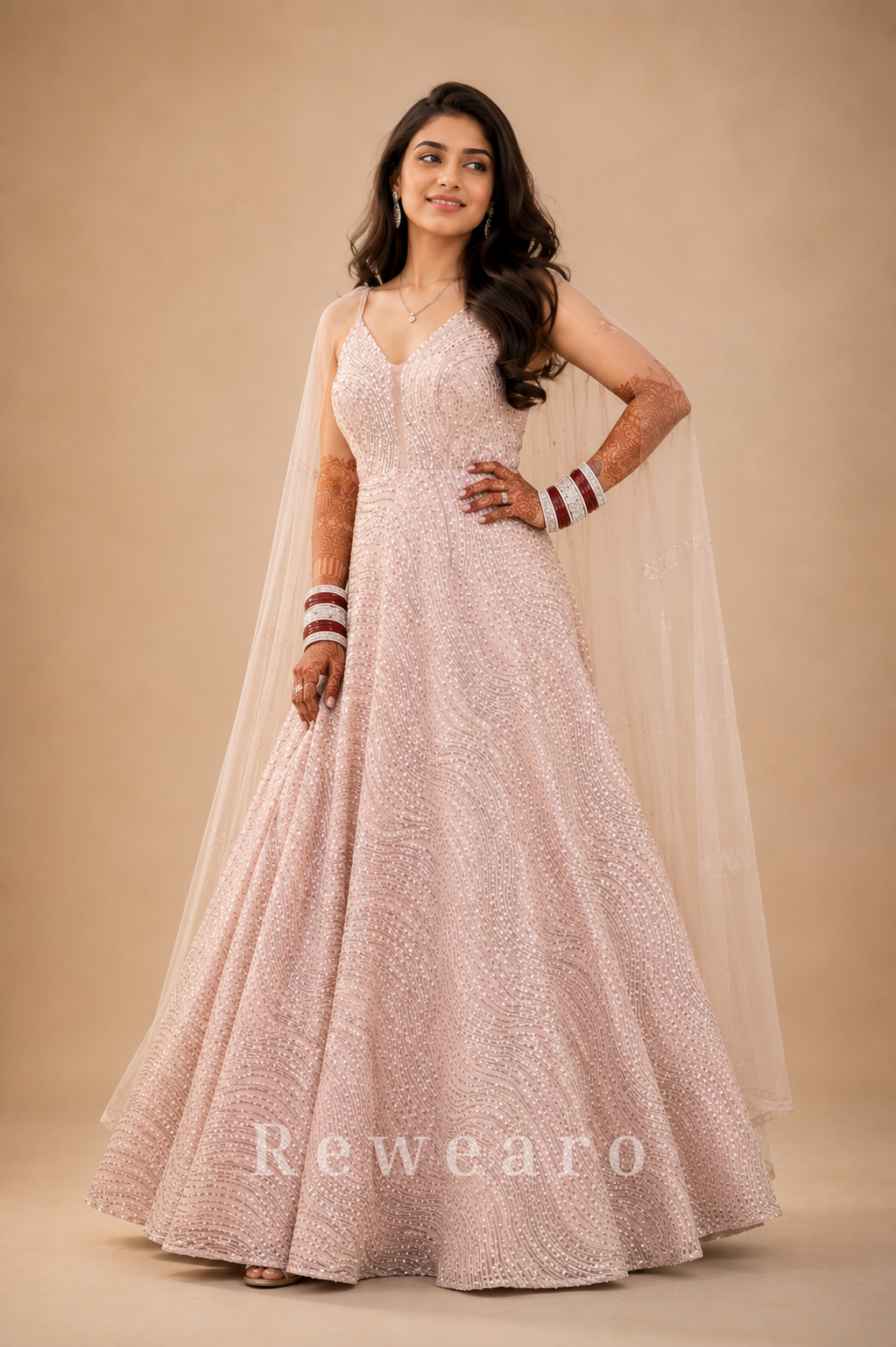 Blush Pink Sequined Evening Gown with Sheer Cape Sleeves