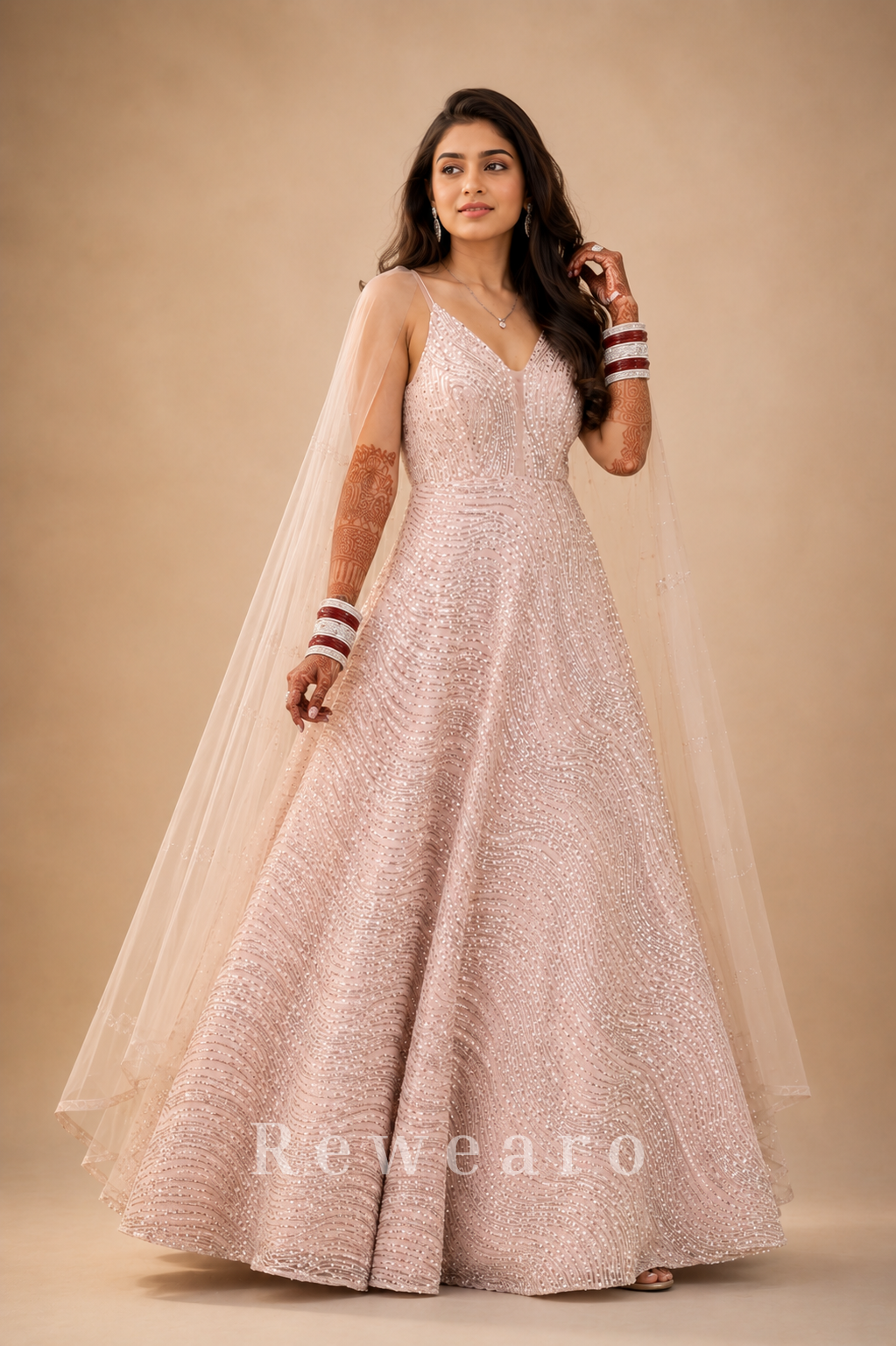 Blush Pink Sequined Evening Gown with Sheer Cape Sleeves