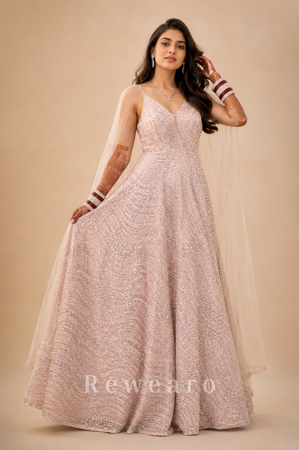 Blush Pink Sequined Evening Gown with Sheer Cape Sleeves