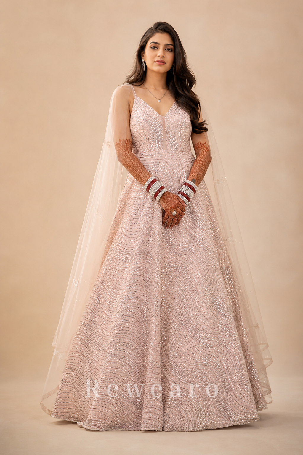 Blush Pink Sequined Evening Gown with Sheer Cape Sleeves