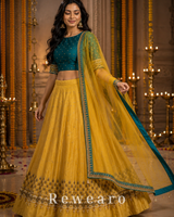 Teal Embroidered Blouse with Mustard Gold Lehenga & Sheer Dupatta
