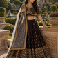 Midnight Noir Heritage Embroidered Lehenga Set with Ornate Gold Blouse and Sheer Dupatta