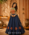Navy Blue Printed Lehenga with Multicoloured Kutchi Embroidered Halter Blouse & Tasselled Details