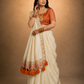 Ivory Draped Saree with Rust Embroidered Blouse and Tassel Border Pallu