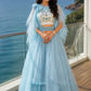 Powder Blue Layered Ruffle Lehenga Set with Printed Blouse and Dramatic Cape Sleeves
