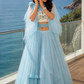 Powder Blue Layered Ruffle Lehenga Set with Printed Blouse and Dramatic Cape Sleeves