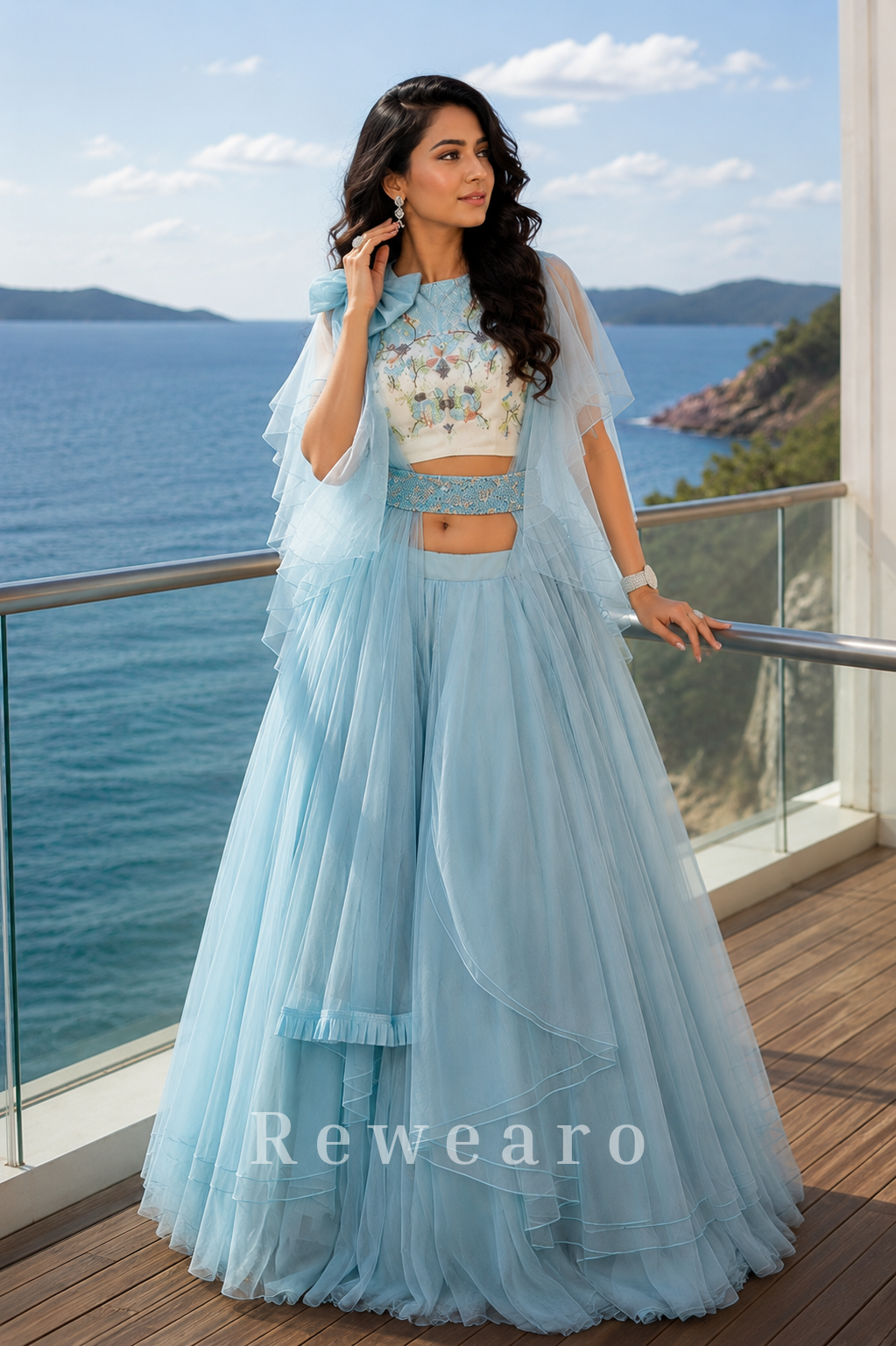 Powder Blue Layered Ruffle Lehenga Set with Printed Blouse and Dramatic Cape Sleeves
