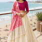 Fuchsia Pink Blouse with Ivory Lehenga and Floral Banarasi Style Dupatta