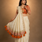 Ivory Draped Saree with Rust Embroidered Blouse and Tassel Border Pallu