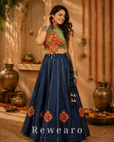 Navy Blue Printed Lehenga with Multicoloured Kutchi Embroidered Halter Blouse & Tasselled Details