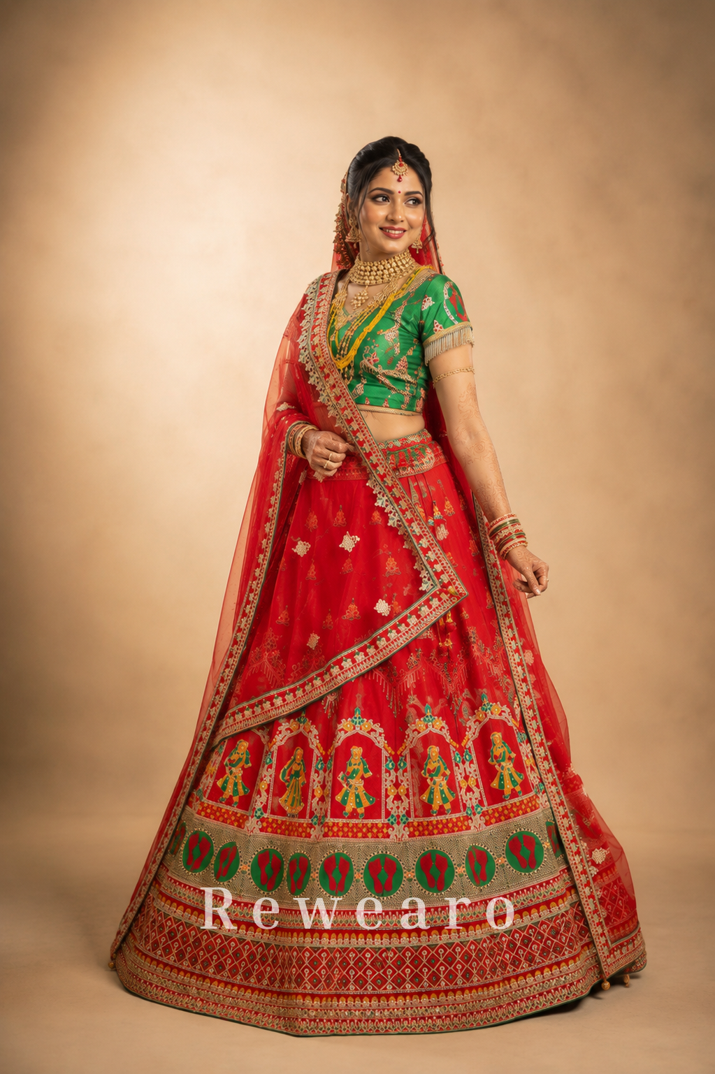 Crimson Bridal Lehenga with Folk-Figurative Border, Emerald Brocade Blouse & Ornate Veil