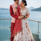 Ivory Embroidered Sider Lehenga Set with Coral Bandhani Style Dupatta and Coordinated Kurta Jacket Set