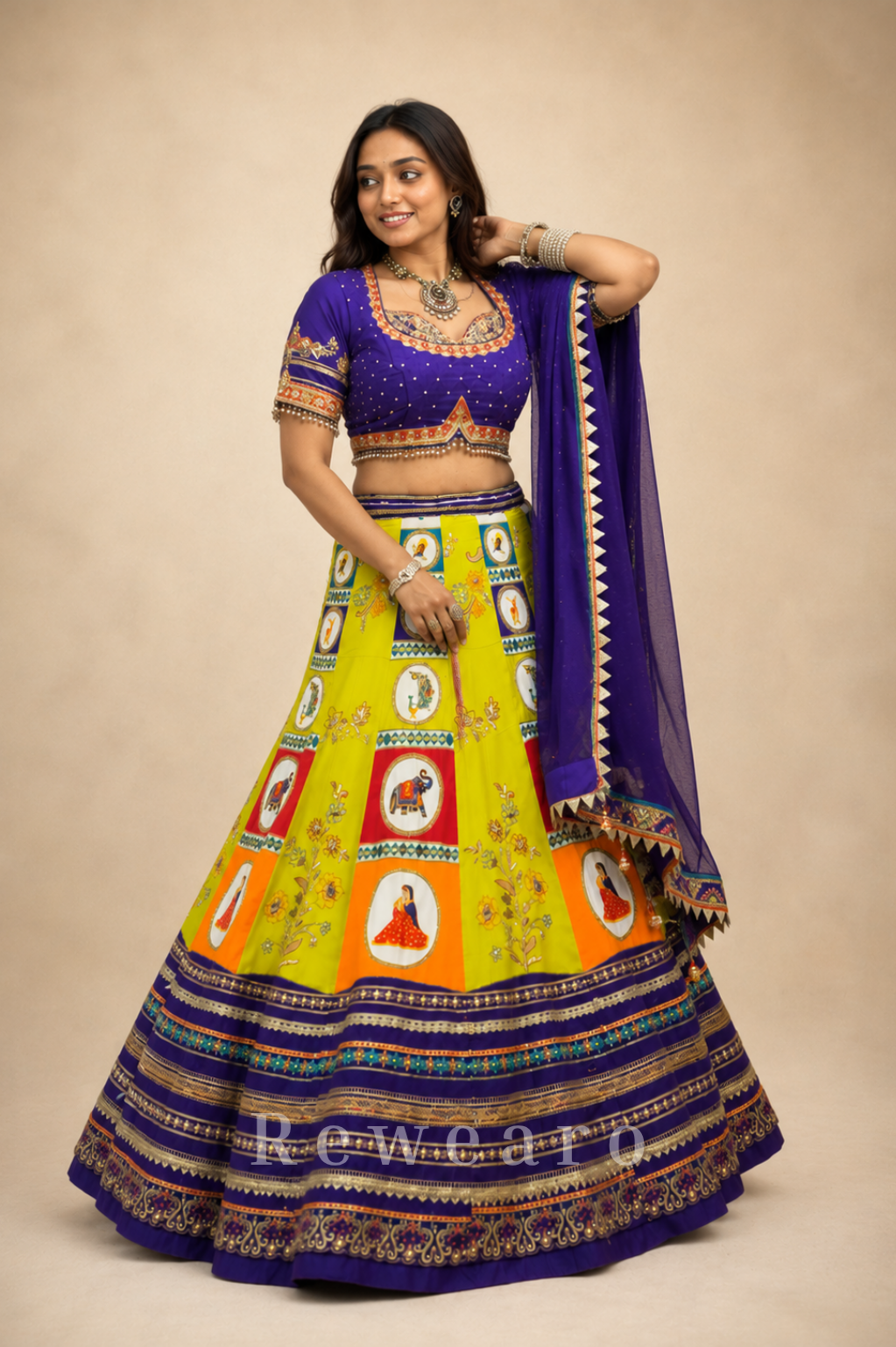 Vibrant Folk Art Patchwork Lehenga Set with Royal Blue Embroidered Blouse & Dupatta
