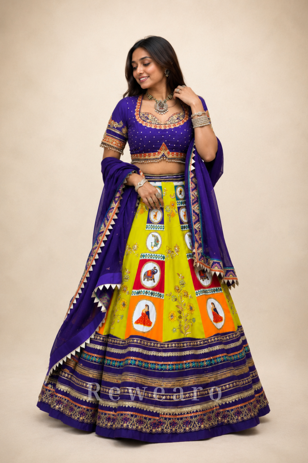 Vibrant Folk Art Patchwork Lehenga Set with Royal Blue Embroidered Blouse & Dupatta